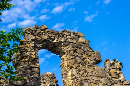 ruined walls of the castle in the cloudsの写真素材
