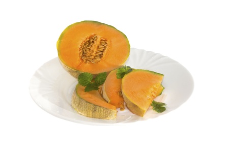 fresh melon on a plateの写真素材