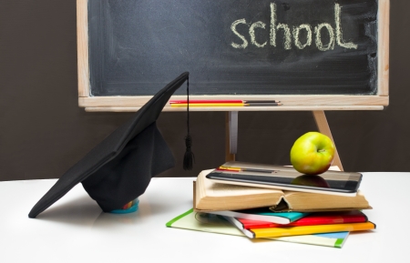Back to school-board with books, notebooks and school supplies background の写真素材