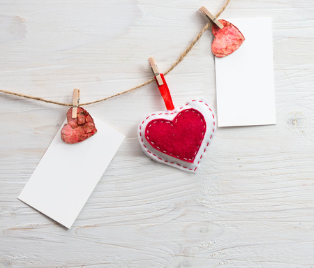 Two blank for writing text with hearts on the clothespin.Symbol of love.の写真素材