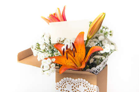 fresh orange lily flowers in the compositionの写真素材