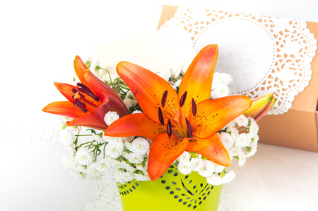 fresh orange lily flowers in the compositionの写真素材