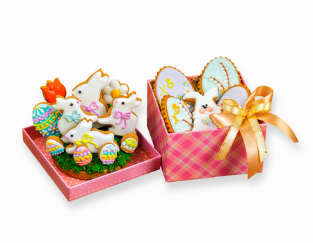 Easter cookies white bunny and colored eggs in a gift boxes on the eve ofの写真素材