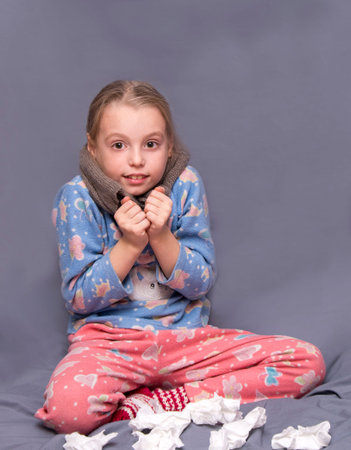 Little girl is sick runny nose,chill.の写真素材
