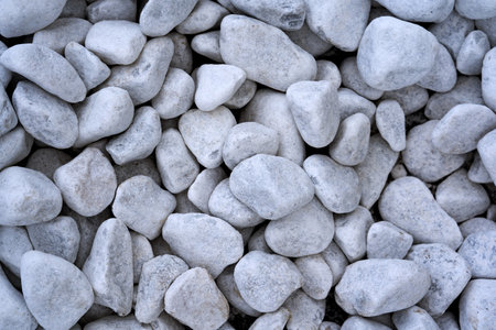 White pebbles, stone for landscape design. Texture and background, decorative stone.の写真素材