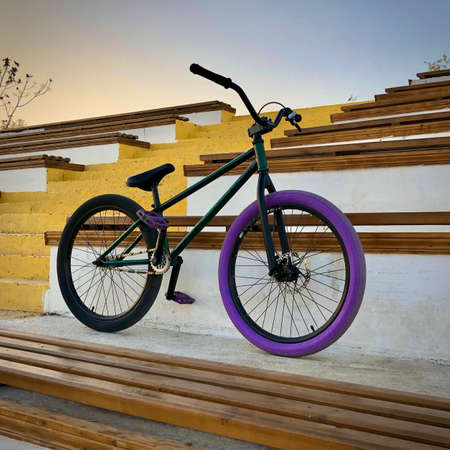 Colorful extreme bicycle on large stepsの写真素材