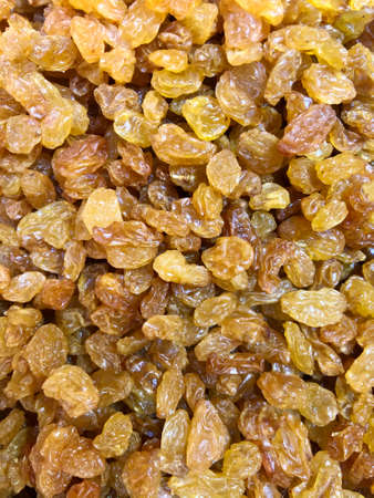Golden raisins pattern backgroundの写真素材