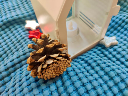 Christmas decorations on a cozy blanketの写真素材