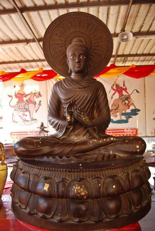 Bronze buddha statue look real figure inthailandの写真素材