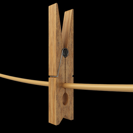 wooden clothespins on a rope. realistic. isolated on black background. 3d illustrationの写真素材