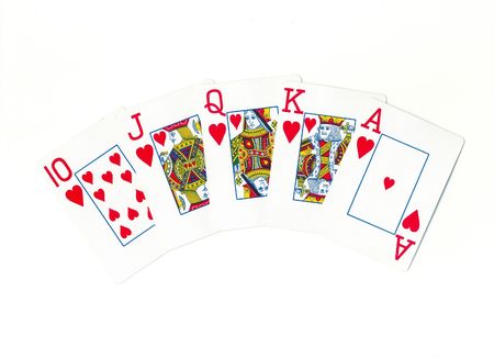 Playing cards of different colors on the table isolated on white backgroundのeditorial素材