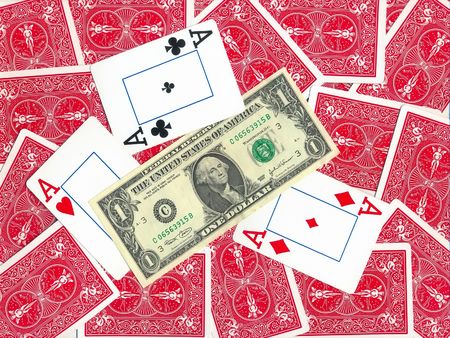 Background of money and playing cards isolated over whiteのeditorial素材
