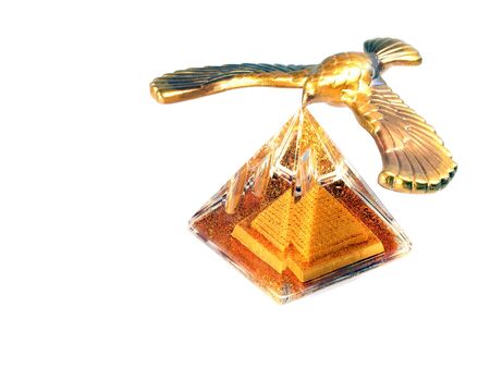 Souvenir eagle over pyramid isolated on white backgroundの写真素材