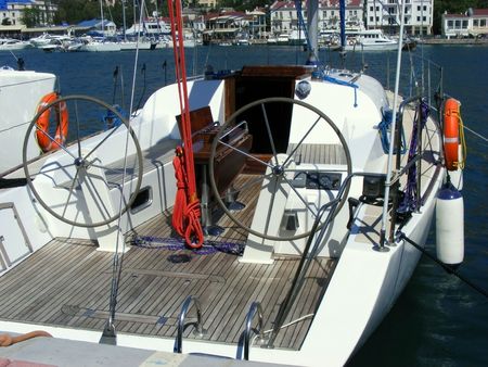 Marine yacht moored with two control columns with pier using ropesの写真素材