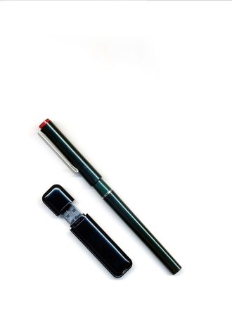 Pen and external memory device for computer isolated on a white backgroundの写真素材