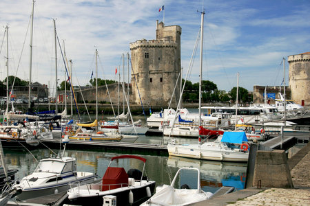 Pleasure view of La Rochelle port with boats and towersの写真素材