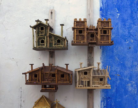 Funny starling-houses for migrant birdsの写真素材