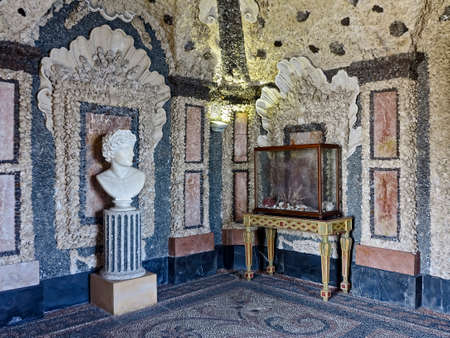 Pebbles and fragments of tufa, stucco and marble decorate the grotto in sumptuous Borromeo palace, Isola Bella, Italy.のeditorial素材