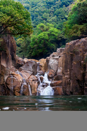 Waterfalls on crack rocks