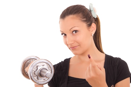 young healthy women pointing to the weightsの写真素材