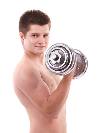 muscular man lifting weights isolated on whiteの写真素材