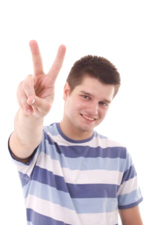 young healthy  man pointing a victoryの写真素材