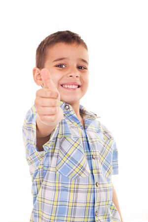 young healthy smiling boy posing isolated on whiteの写真素材