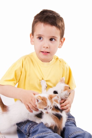 smiling young boy with catの写真素材