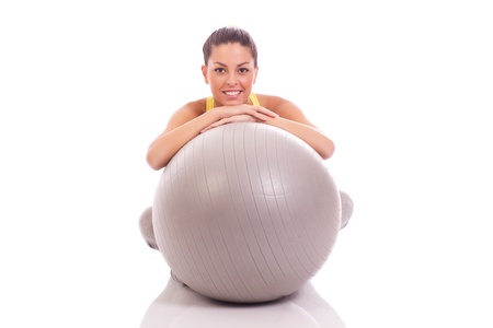  pretty young woman holding fitness ball の写真素材