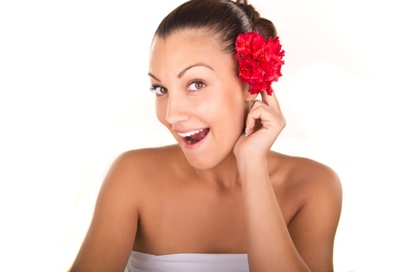 woman face portrait with red flowersの写真素材
