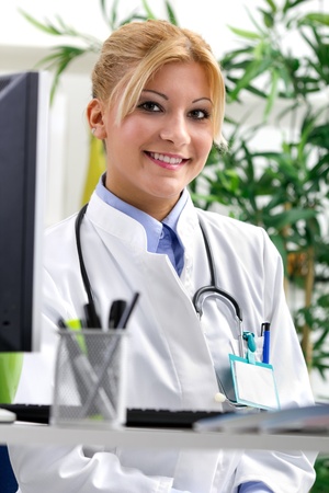 Portrait of a friendly female doctor の写真素材