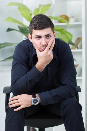 depressed bussinesman worried  about too much workの写真素材