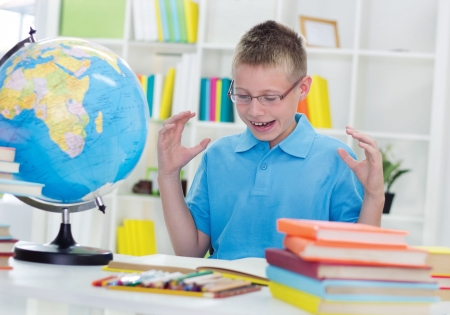 pleased boy finished his homeworkの写真素材