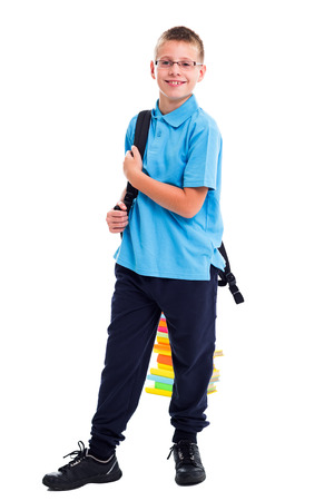 Schoolboy wearing backpack ready to go to schoolの写真素材