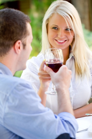 Romantic couple have a toast with wine の写真素材