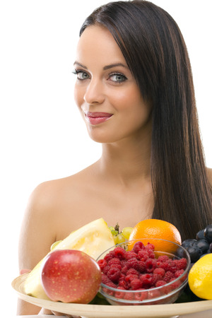 Beautifu youngl woman with fresh fruitの写真素材