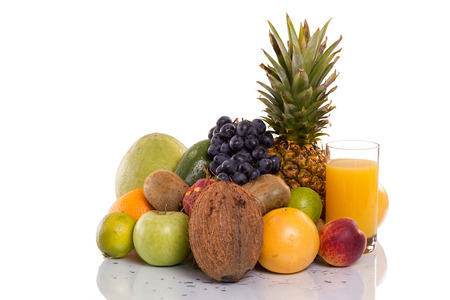 lots of fresh fruits and vegetables,and glass with orange juiceの写真素材