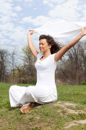 woman enjoying and relaxing outsideの写真素材