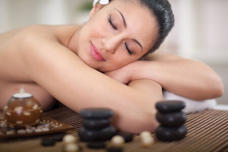  beautiful woman relaxing in spa centerの写真素材