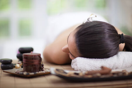 beautiful woman relaxing in spa centerの写真素材