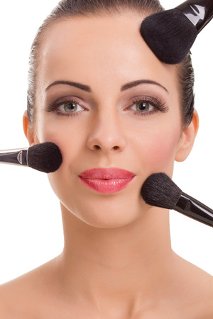 beauty girl with makeup brushesの写真素材