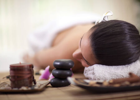 beautiful woman relaxing in spa centerの写真素材