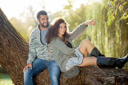 beautiful young couple in love in parkの写真素材