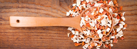 vegeta in wooden spoon ,on wooden backgroundの写真素材