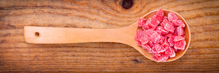 dried papaya wooden spoon ,on wooden backgroundの写真素材