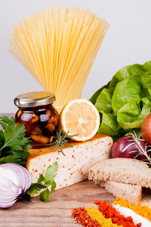 herbs and spices. Organic vegetables on woodの写真素材