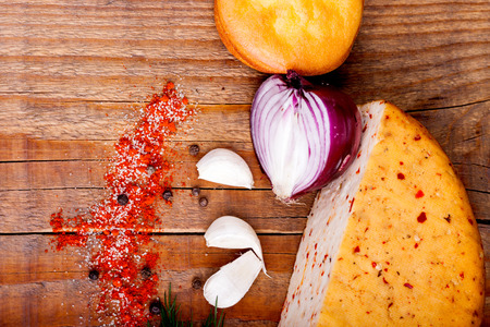 fresh spices and cooking ingredients on wooden tableの写真素材