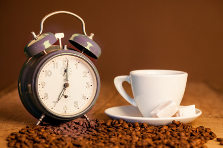 coffee cups, old alarm clock, the concept of coffeeの写真素材