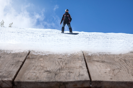 snowboarder, extreme winter sport on blue skyの写真素材