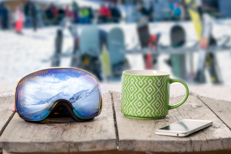 Colorful ski glasses coffe our tea cup winter themeの写真素材